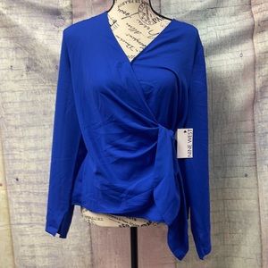 Brand new Woman’s Nine West wrap blouse. Size M.